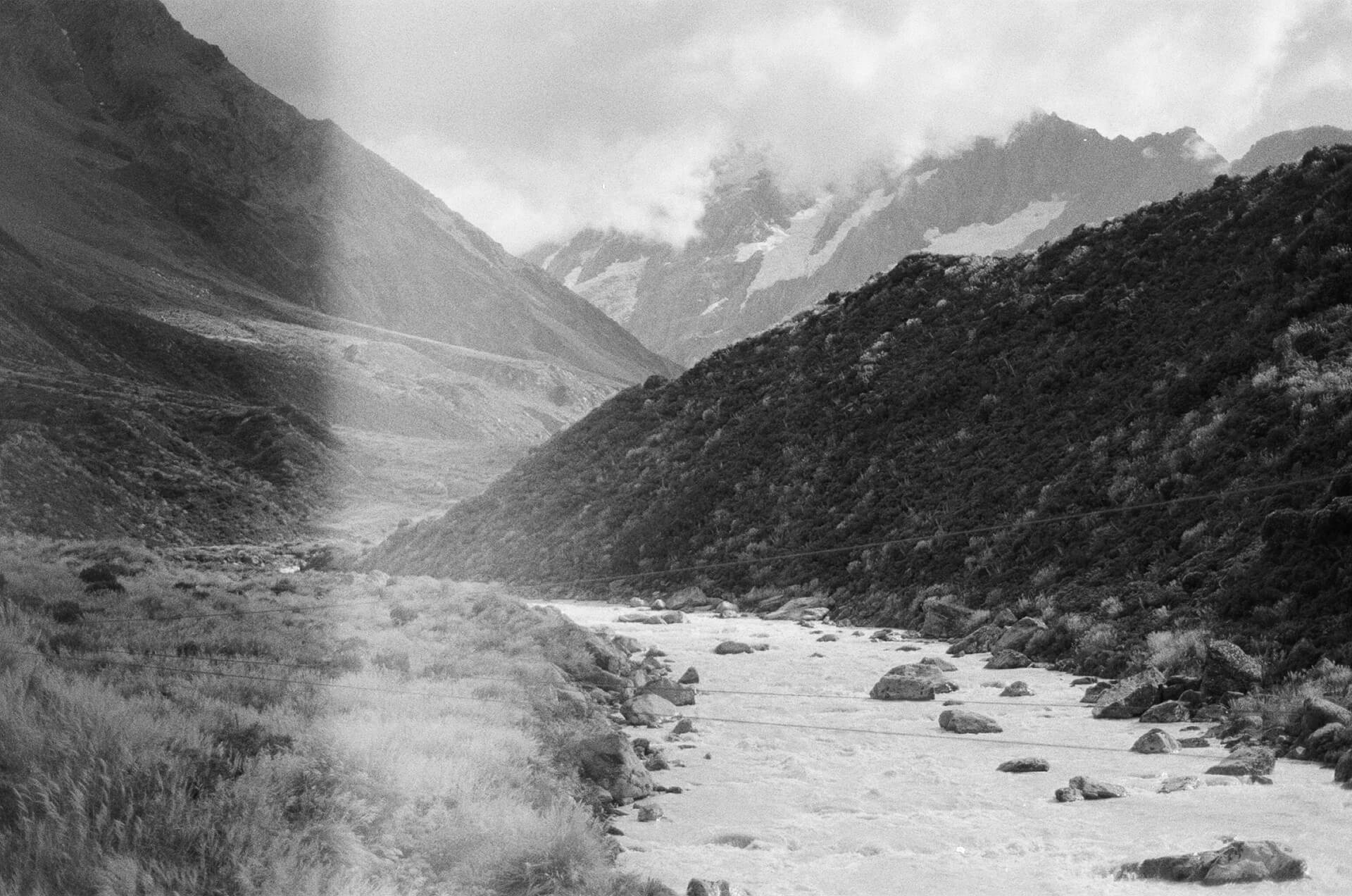 Black and white film image of a mountain